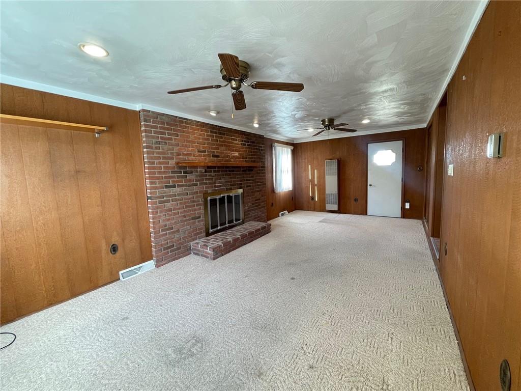 405 Routh Street Monroeville, PA 15146 - Photo 5 of 18 a view of a livingroom with a fireplace