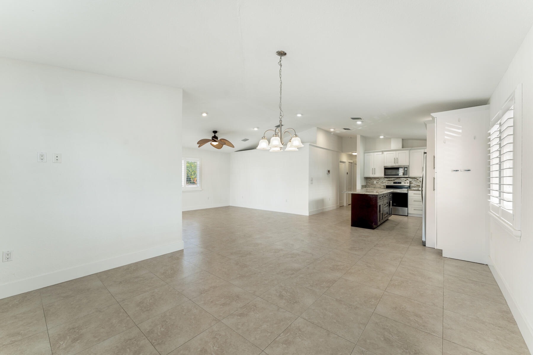 955 Plantation Road Key Largo, FL 33037 - Photo 11 of 37 a view of a kitchen with a sink