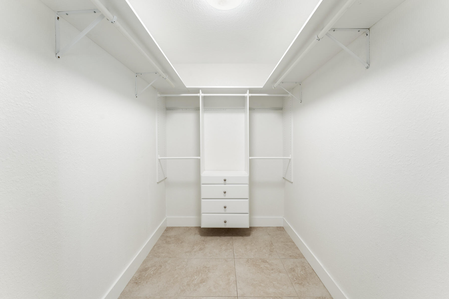 955 Plantation Road Key Largo, FL 33037 - Photo 26 of 37 a view of an empty walk in closet