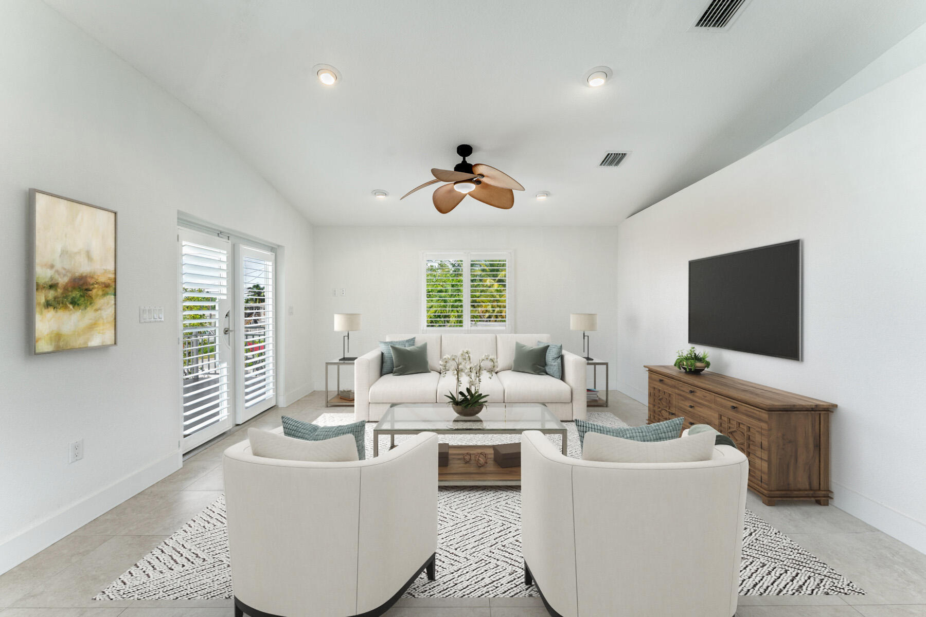 955 Plantation Road Key Largo, FL 33037 - Photo 4 of 37 a living room with furniture a flat screen tv and a large window