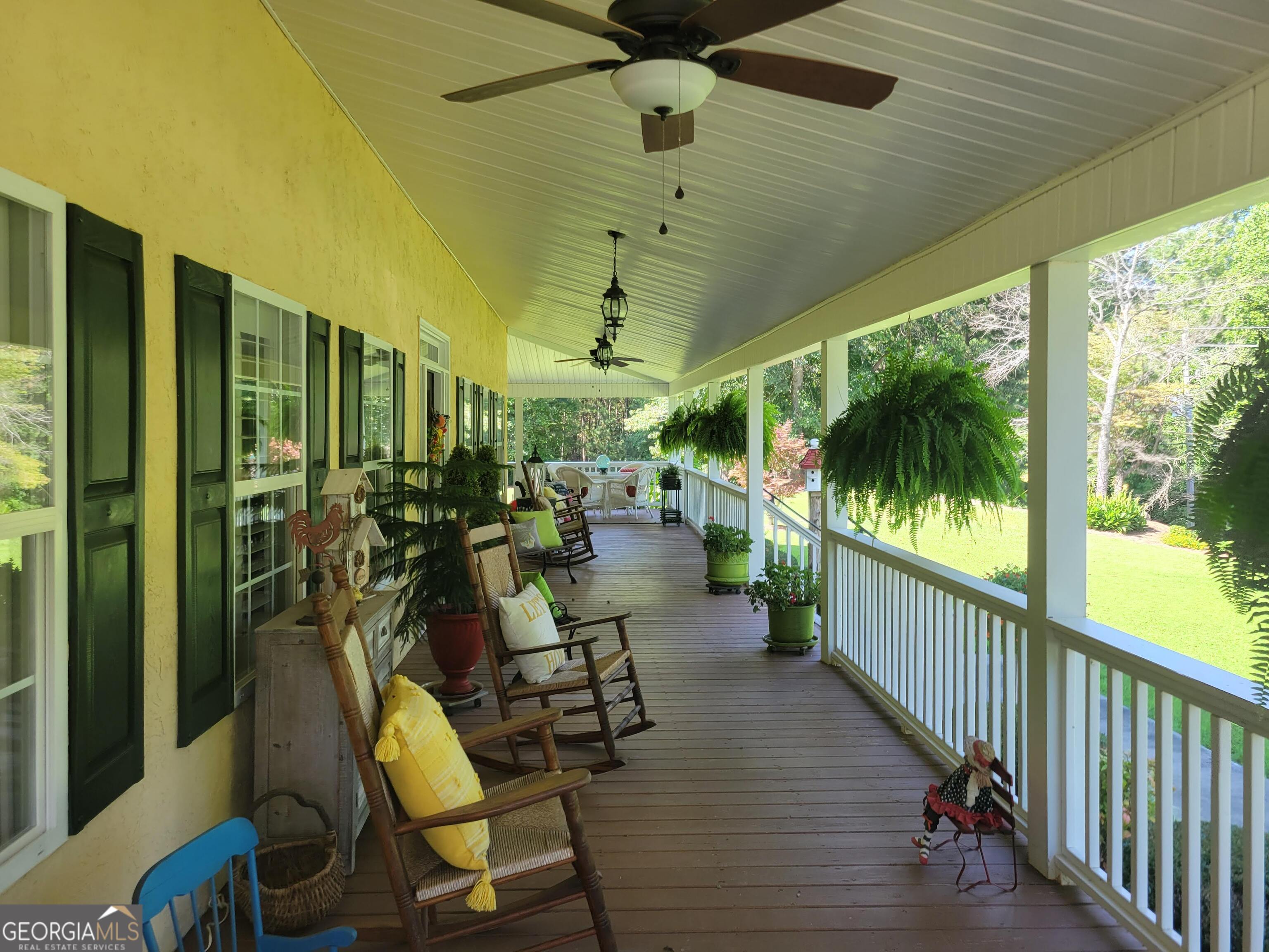 5325 Bethlehem Road Fairburn, GA 30213 - Photo 4 of 21 a view of a porch with chairs
