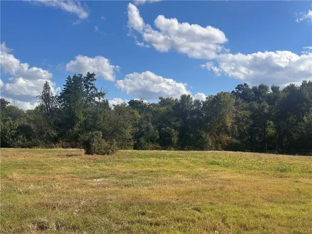 a view of swimming pool with mountain in the background