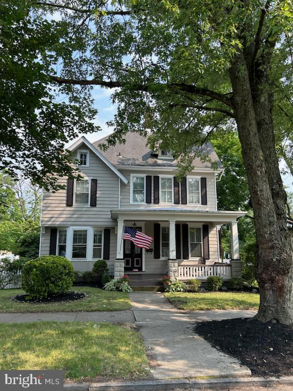 200 Broad Street Mount Holly, NJ 08060 - Photo 1 of 19 a front view of a house with a garden