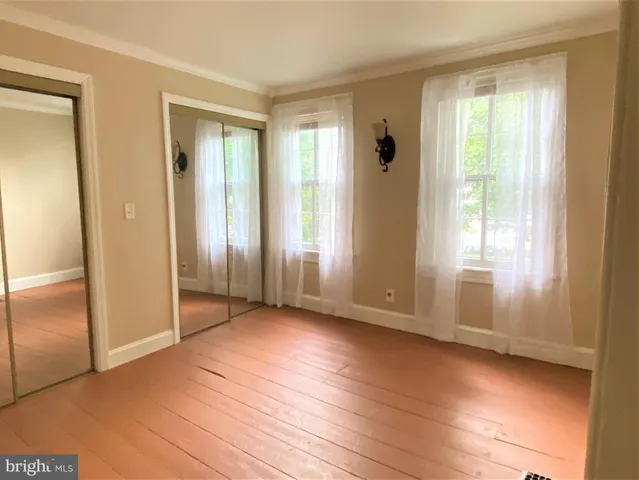a view of livingroom with hardwood floor and window