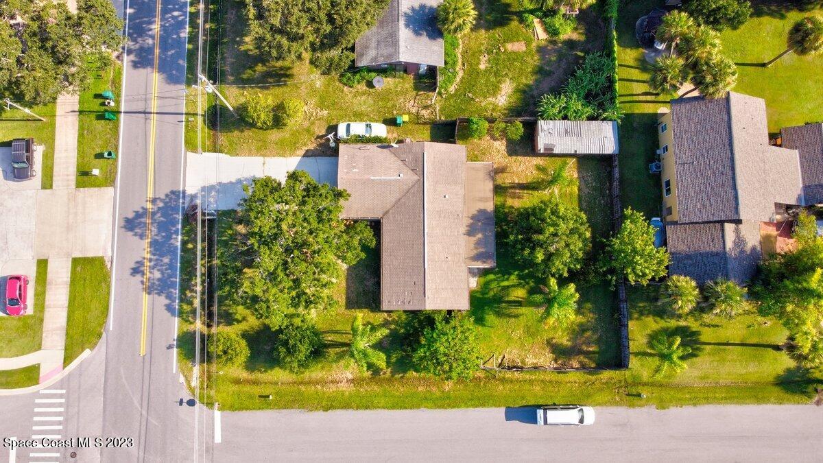 2160 Stewart Road Melbourne, FL 32935 - Photo 14 of 18 front view of a house with a yard