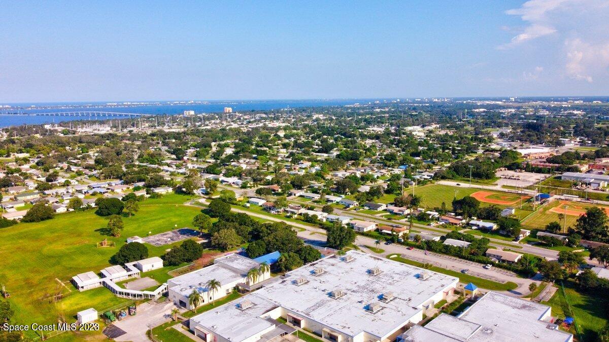 2160 Stewart Road Melbourne, FL 32935 - Photo 17 of 18 an aerial view of a city with lots of residential buildings