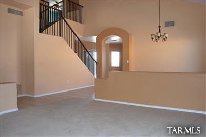 1118 South Riparian Avenue Tucson, AZ 85748 - Photo 8 of 13 a view of an entryway with staircase