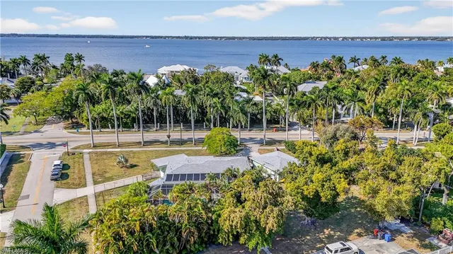 a view of a swimming pool with a yard