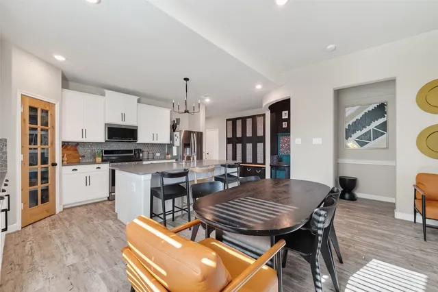 a view of a dining room with furniture