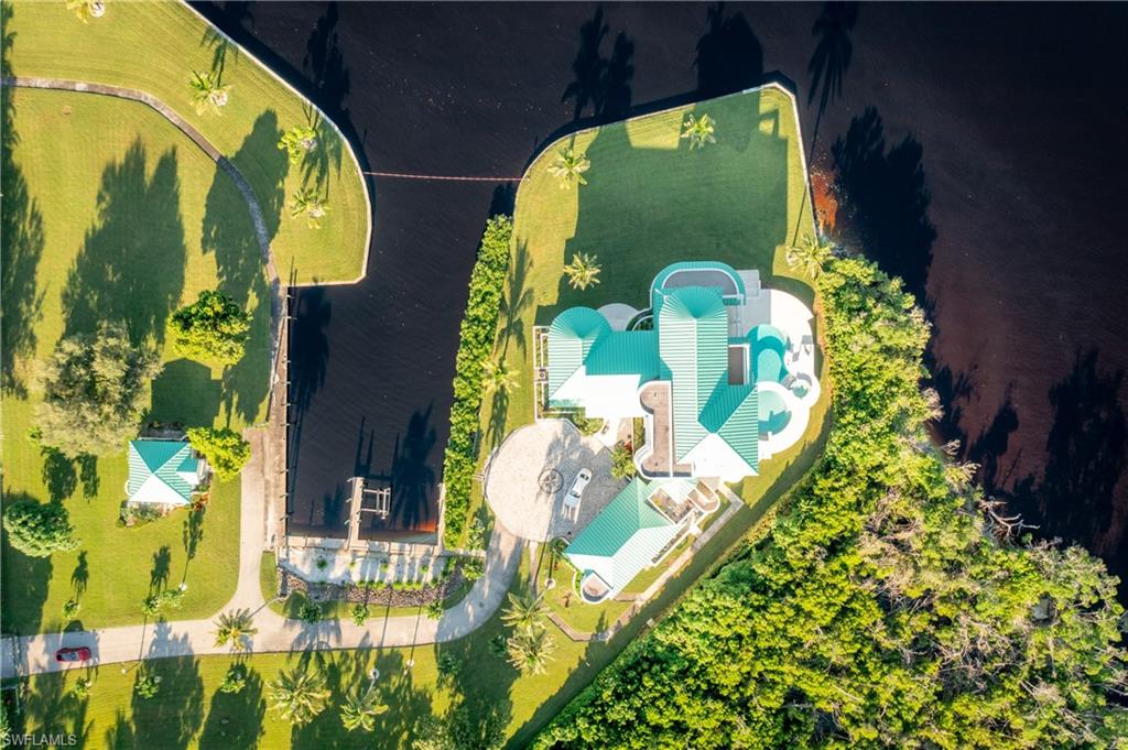 14040 Schultz Road Fort Myers, FL 33908 - Photo 4 of 48 View from above of property with a pool
