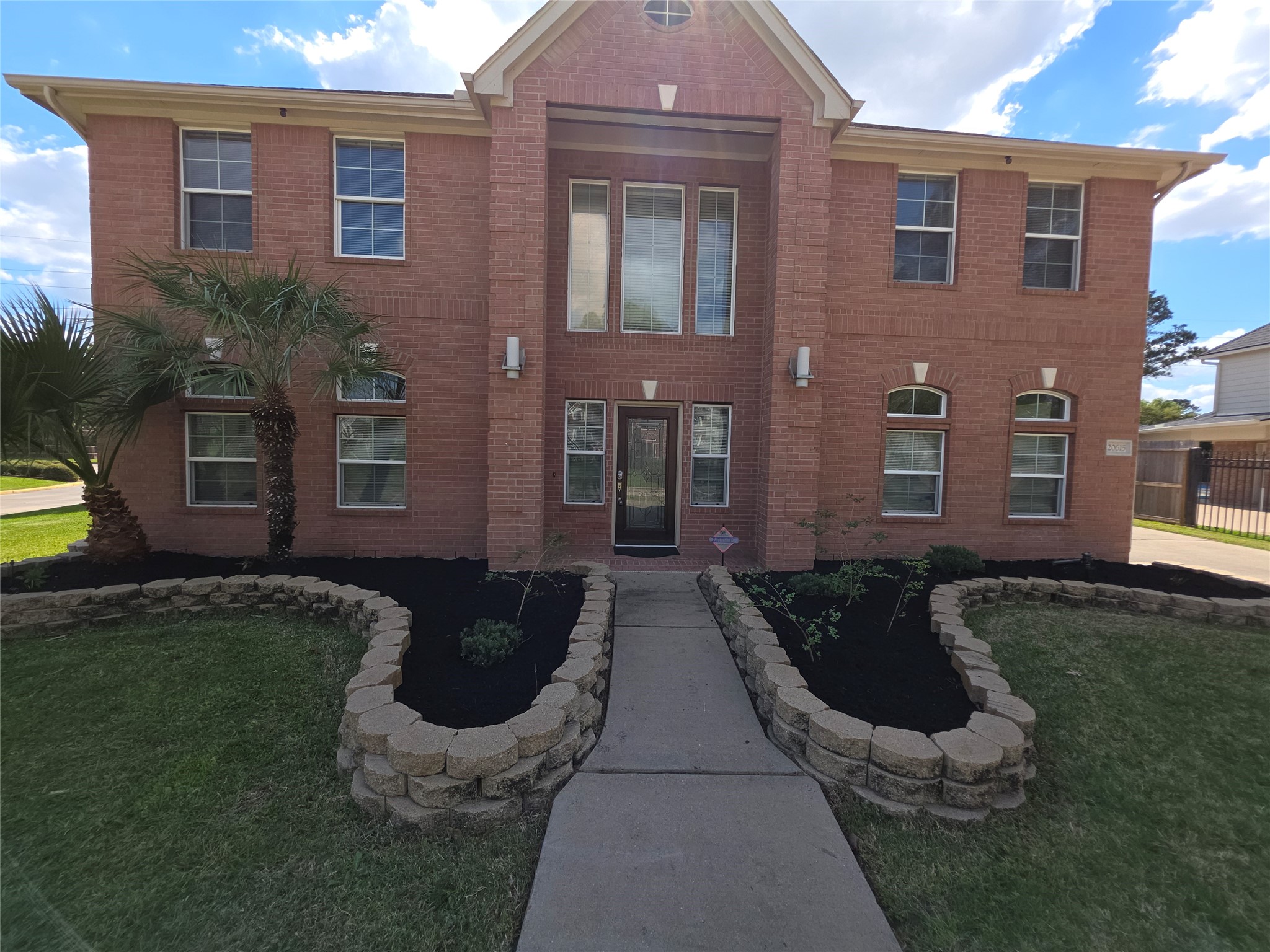 20615 Gable Ridge Drive Katy, TX 77450 - Photo 1 of 42 a front view of a house with garden