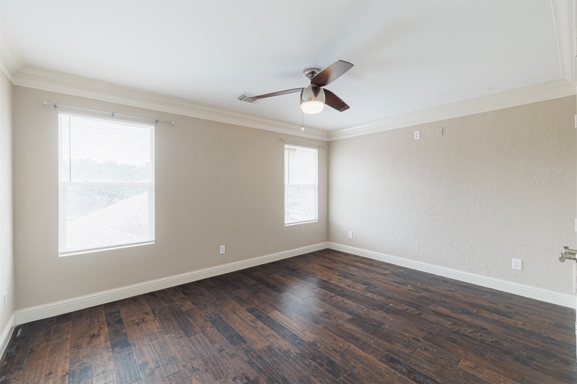 20615 Gable Ridge Drive Katy, TX 77450 - Photo 27 of 42 a view of an empty room with wooden floor and a window