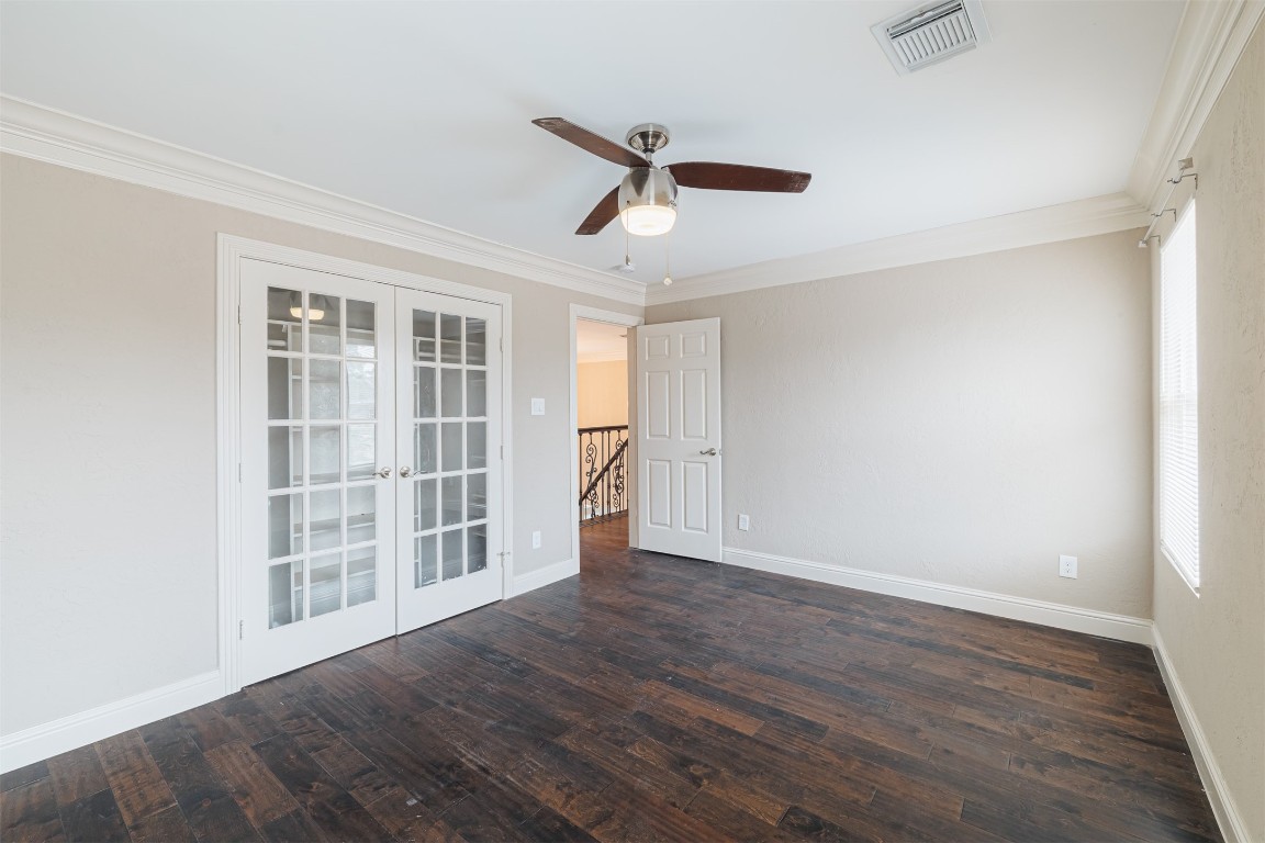 20615 Gable Ridge Drive Katy, TX 77450 - Photo 28 of 42 a view of empty room with wooden floor and ceiling fan