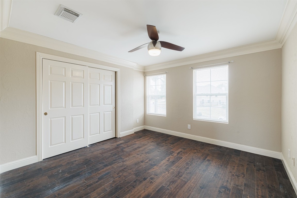 20615 Gable Ridge Drive Katy, TX 77450 - Photo 30 of 42 a view of an empty room with wooden floor and a window
