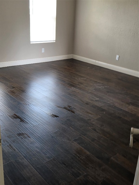 20615 Gable Ridge Drive Katy, TX 77450 - Photo 34 of 42 an empty room with wooden floor and windows