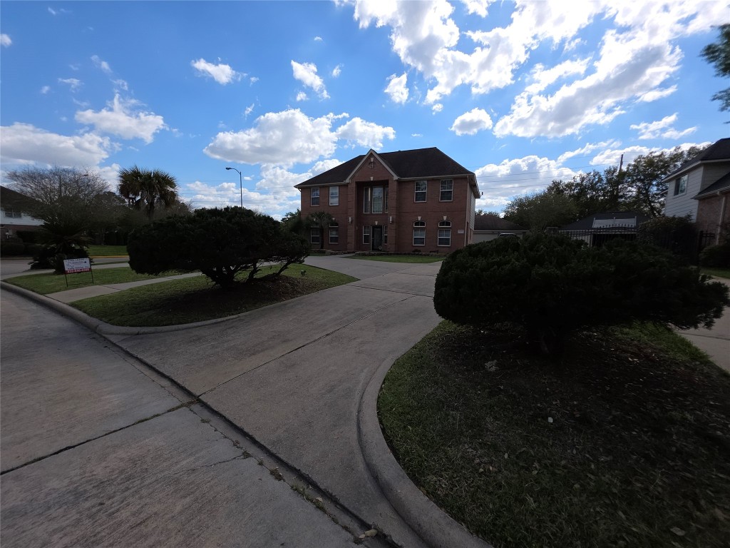 20615 Gable Ridge Drive Katy, TX 77450 - Photo 42 of 42 a front view of a house with a yard