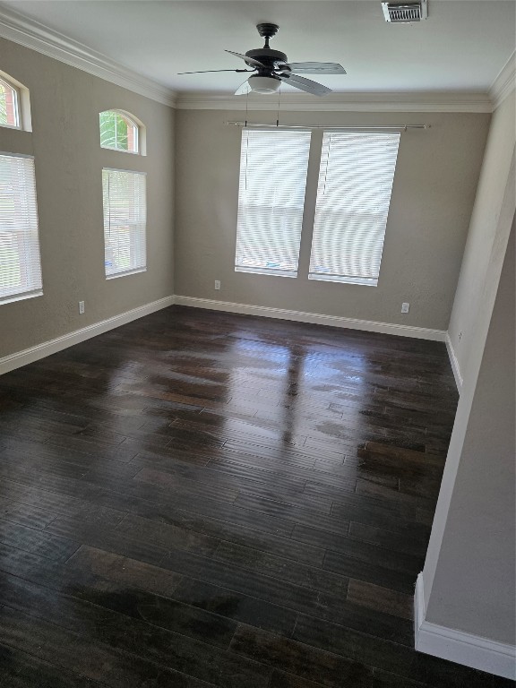 20615 Gable Ridge Drive Katy, TX 77450 - Photo 9 of 42 an empty room with wooden floor cabinet and windows