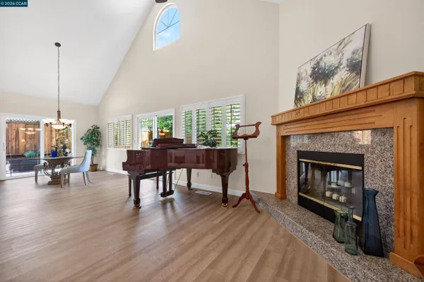 a bed room with a bed and a chandelier