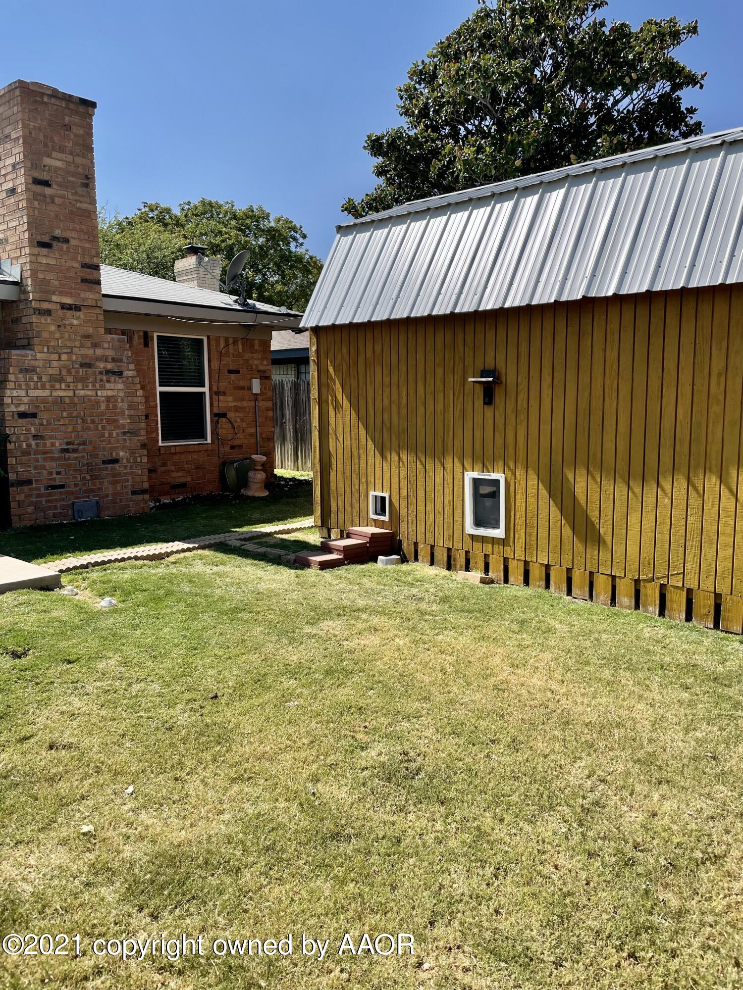 6101 Shawnee Trail Amarillo, TX 79109 - Photo 20 of 20 a view of a house with backyard and porch