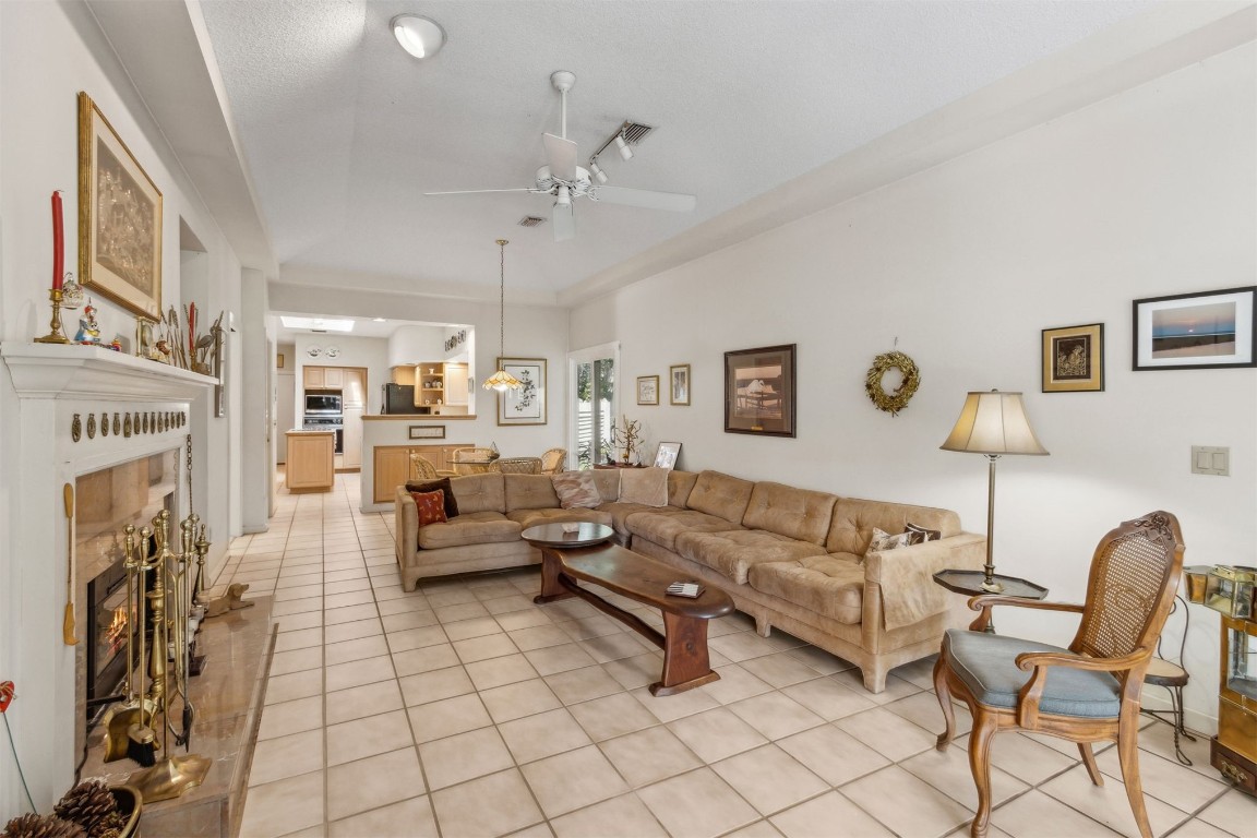 75 Marsh Creek Road Fernandina Beach, FL 32034 - Photo 16 of 42 a living room with furniture and a fireplace