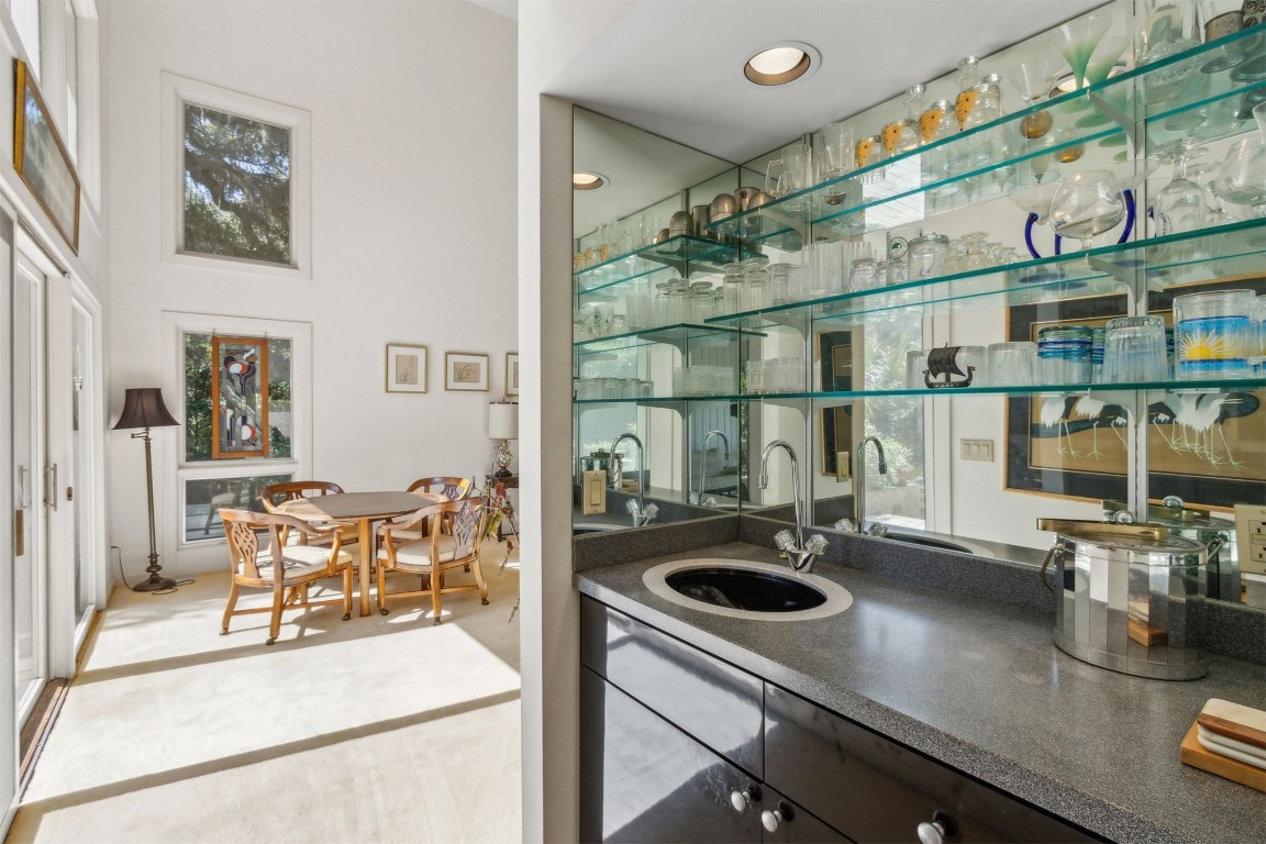 75 Marsh Creek Road Fernandina Beach, FL 32034 - Photo 19 of 42 a kitchen with a sink and a stove top oven