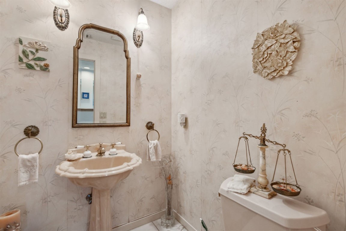 75 Marsh Creek Road Fernandina Beach, FL 32034 - Photo 20 of 42 a bathroom with a sink and mirror