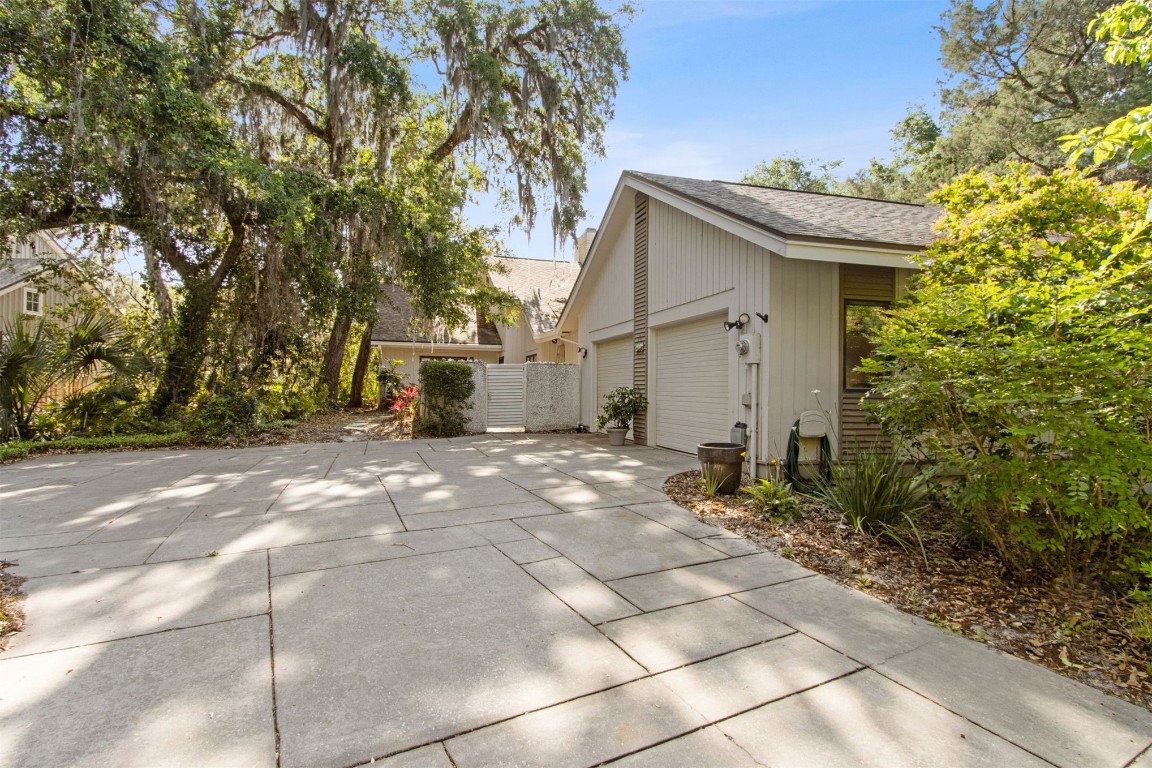75 Marsh Creek Road Fernandina Beach, FL 32034 - Photo 2 of 42 a view of a house with a yard