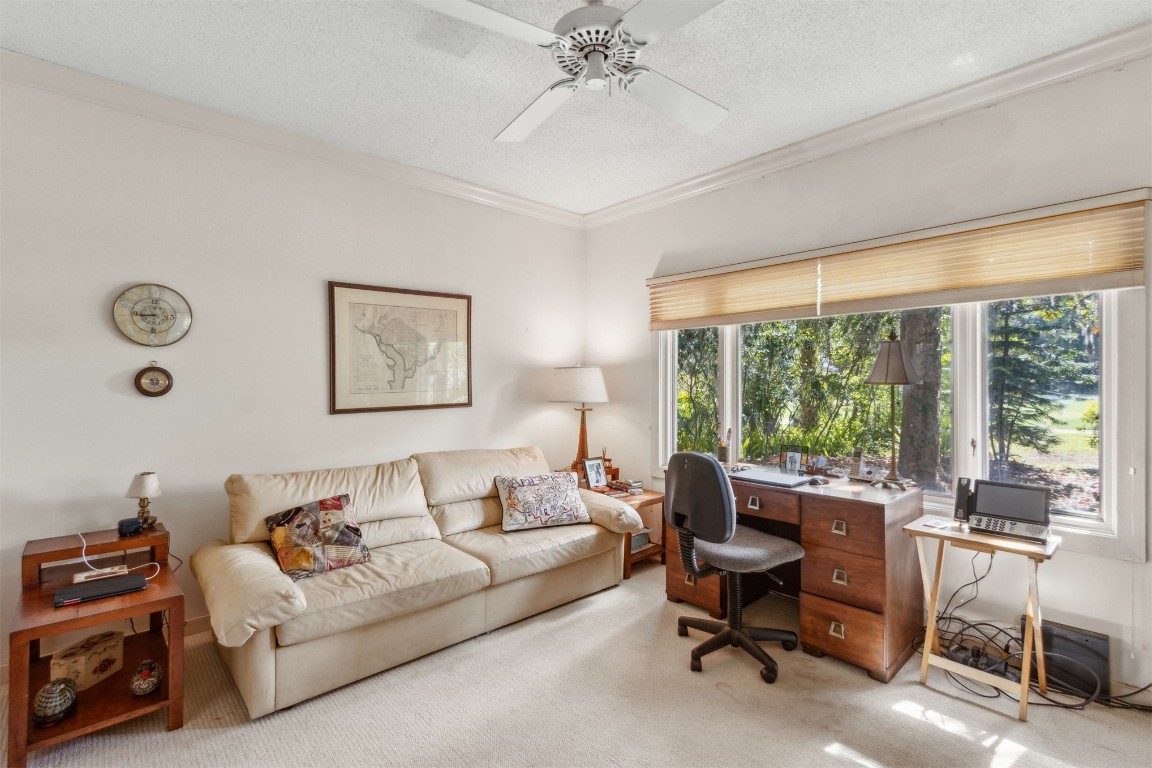 75 Marsh Creek Road Fernandina Beach, FL 32034 - Photo 26 of 42 a living room with furniture and a large window