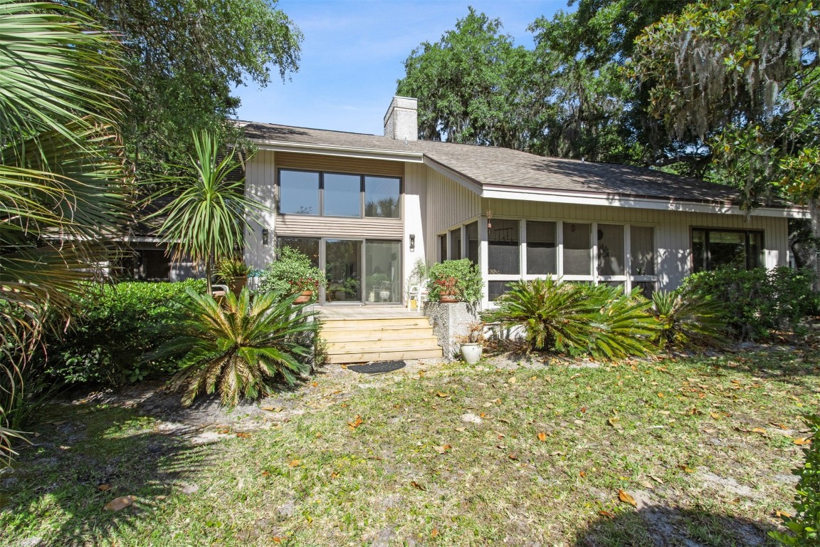 75 Marsh Creek Road Fernandina Beach, FL 32034 - Photo 33 of 42 a house view with a garden space