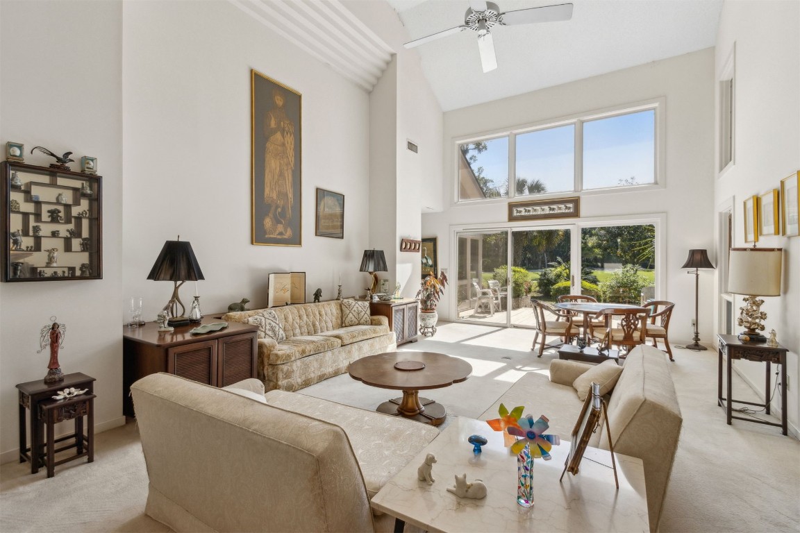 75 Marsh Creek Road Fernandina Beach, FL 32034 - Photo 6 of 42 a living room with furniture and a large window