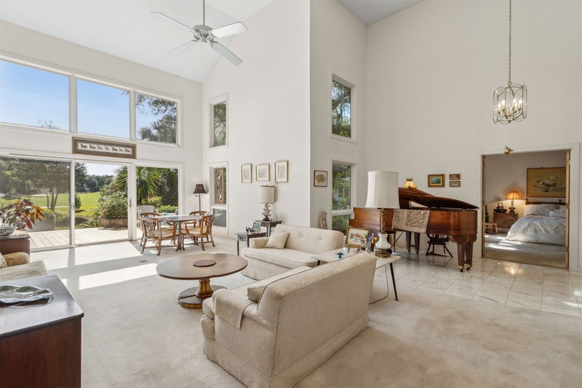 75 Marsh Creek Road Fernandina Beach, FL 32034 - Photo 7 of 42 a living room with furniture and a large window