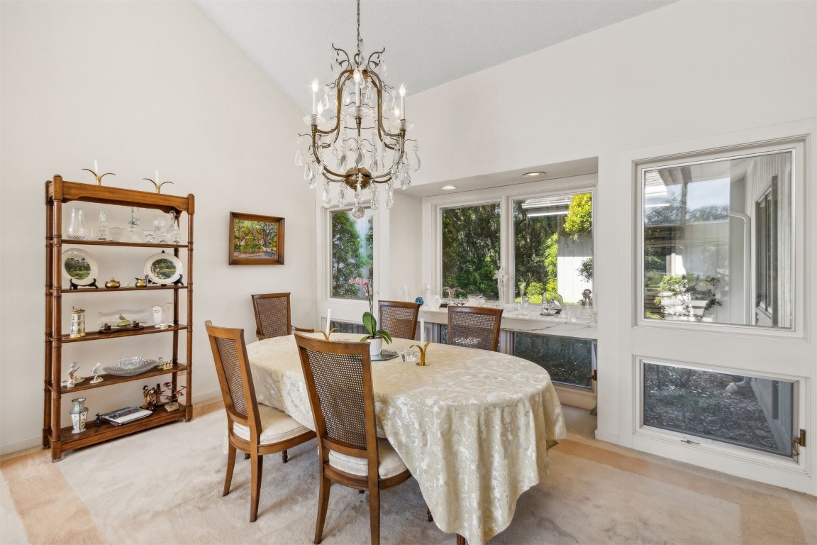 75 Marsh Creek Road Fernandina Beach, FL 32034 - Photo 9 of 42 a view of a dining room with furniture window and outside view
