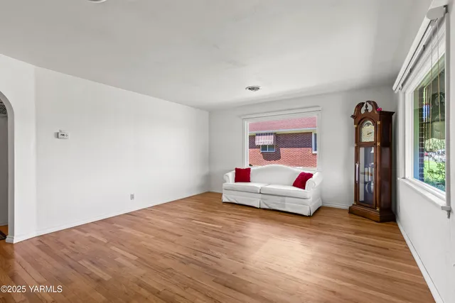 a living room with furniture and window