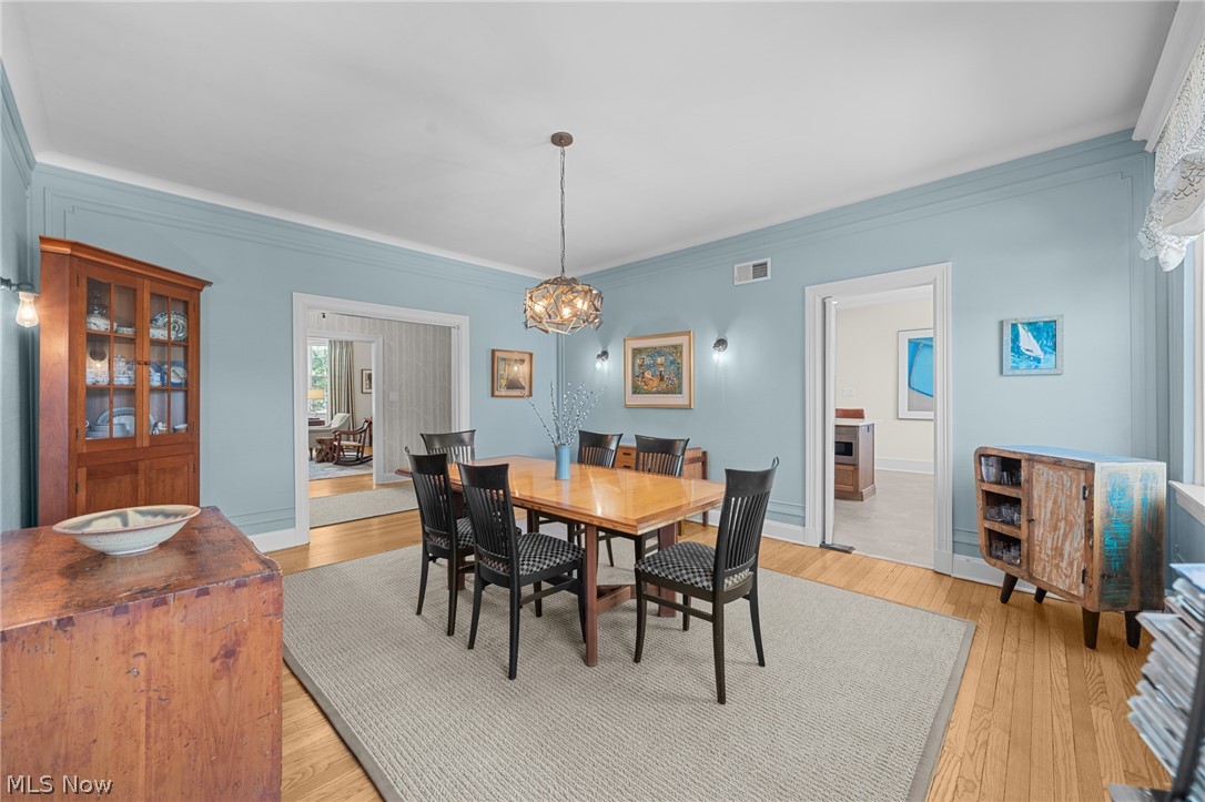 12546 Cedar Road, Unit 4 Cleveland Heights, OH 44106 - Photo 7 of 43 Large formal dining room
with hardwood floors and
custom moldings