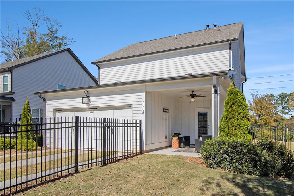 3235 Rockbridge Road Southwest Avondale Estates, GA 30002 - Photo 32 of 37 front view of a house with a porch