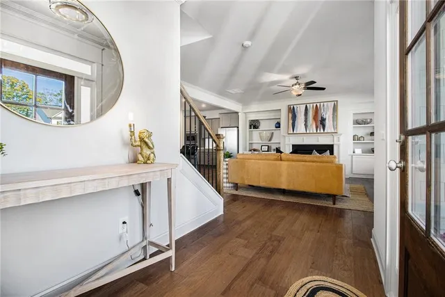 a view of a livingroom with furniture and a flat screen tv