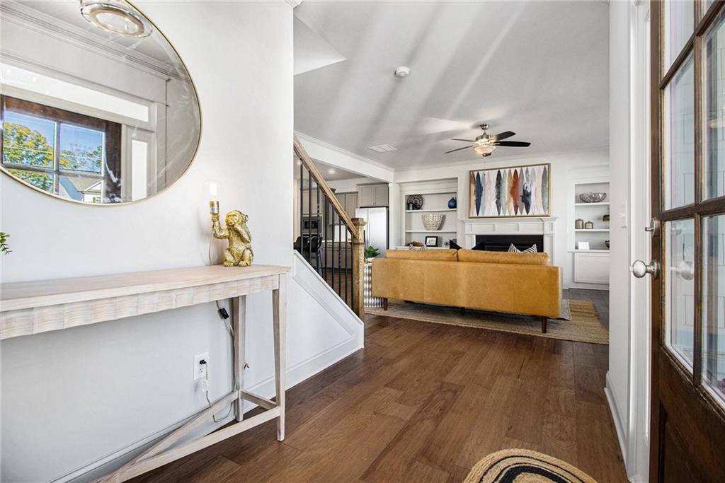 3235 Rockbridge Road Southwest Avondale Estates, GA 30002 - Photo 4 of 37 a view of a livingroom with furniture and a flat screen tv