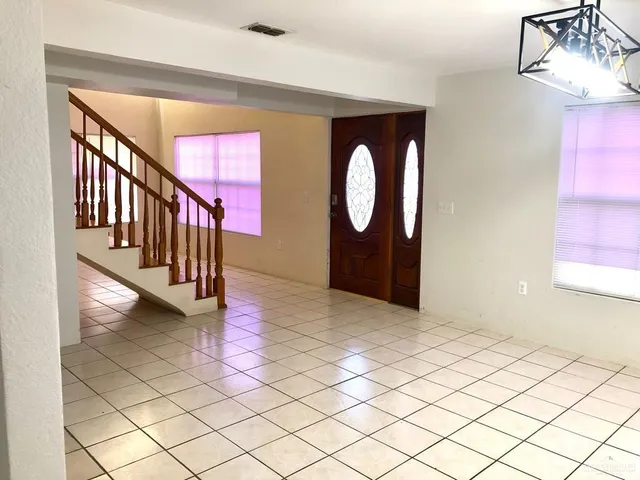 a view of an empty room with window