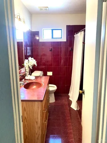 a view of a porch with a garden