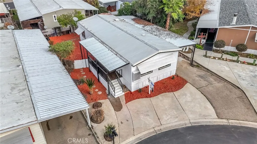 1218 East Cleveland Avenue, Unit 153 Madera, CA 93638 - Photo 32 of 39 an aerial view of a house with terrace seating