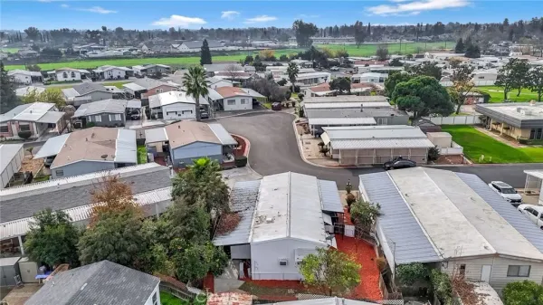 an aerial view of a house with a garden