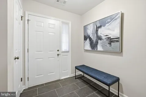 a view of a hallway with workspace