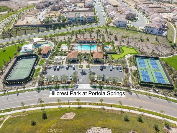 an aerial view of a pool yard swimming pool and outdoor seating