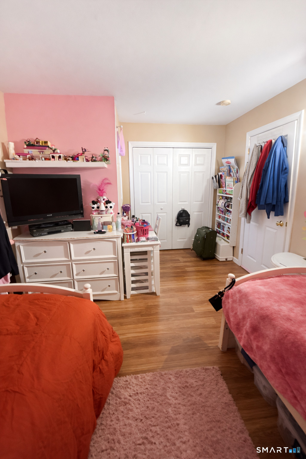 194 Summit Street Norwich, CT 06360 - Photo 20 of 24 a bedroom with a bed and a flat screen tv