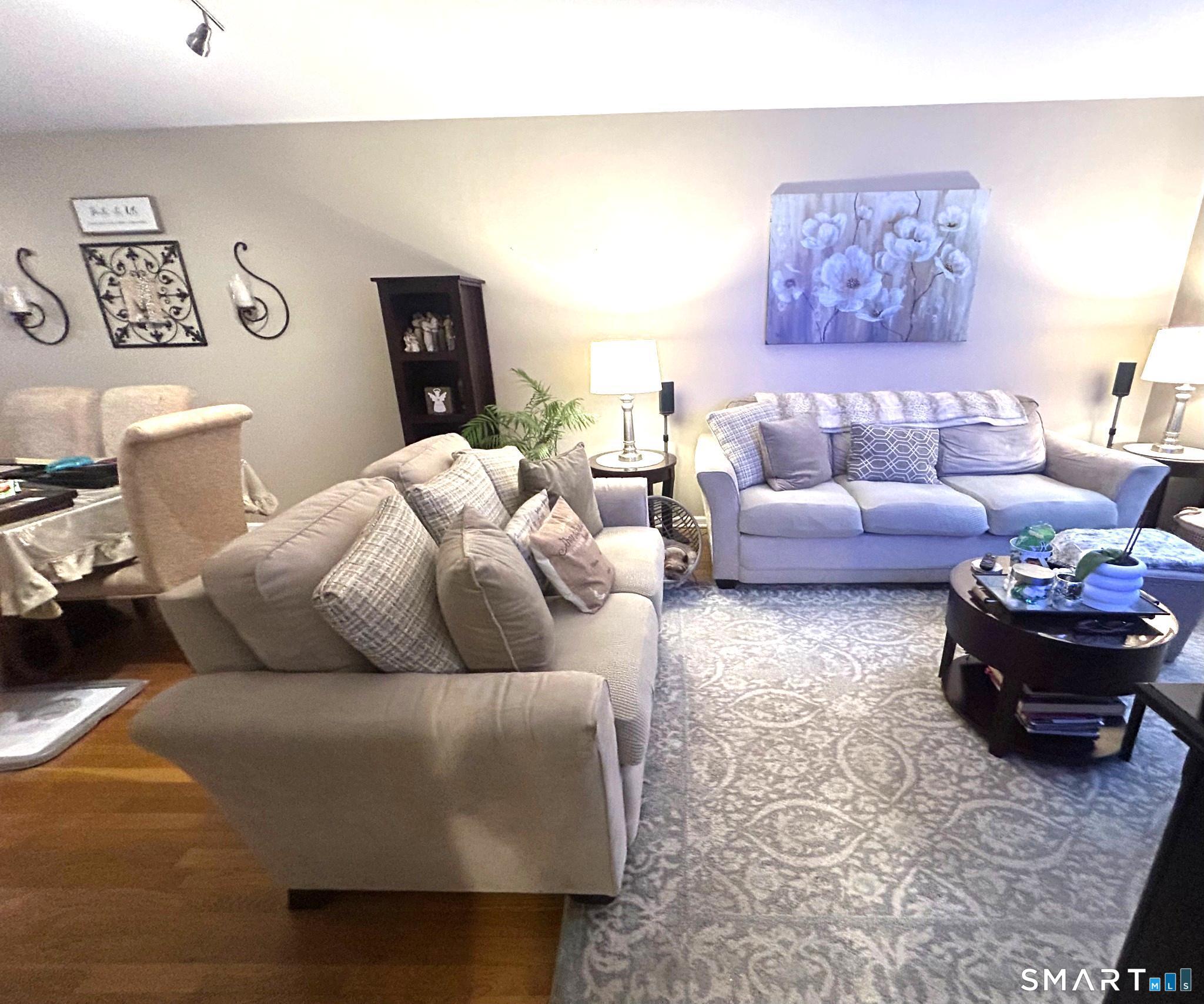 194 Summit Street Norwich, CT 06360 - Photo 8 of 24 a living room with furniture and a couch