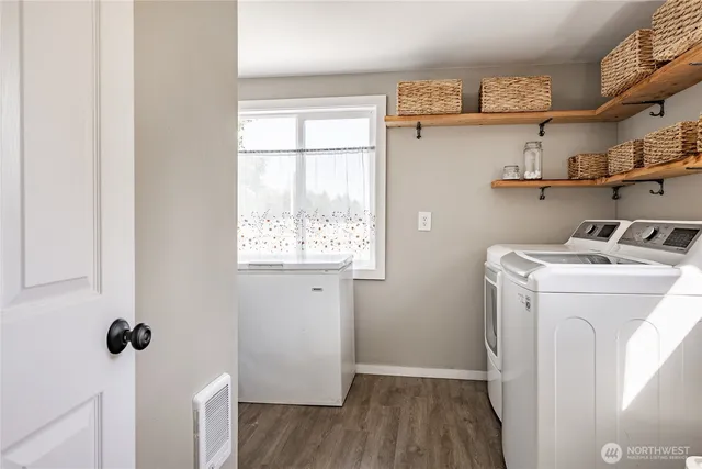 a utility room with dryer and washer
