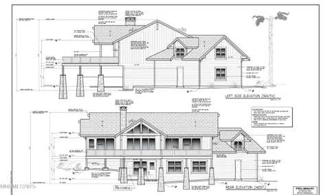 a view of a white building among the street