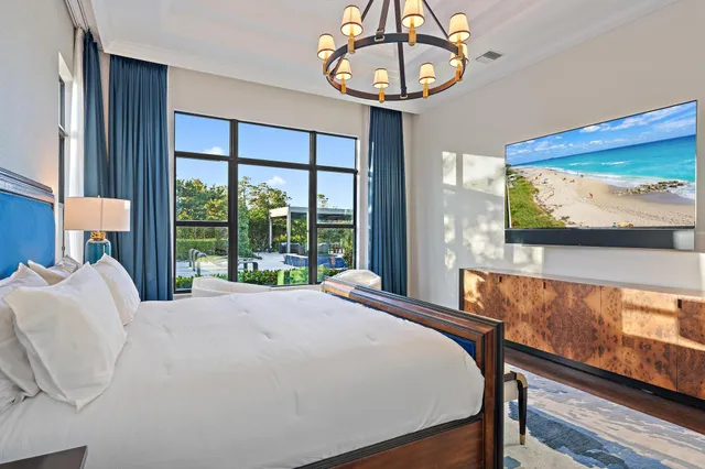 a bedroom with bed and a window