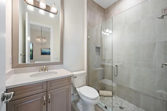 a view of swimming pool with outdoor seating and plants