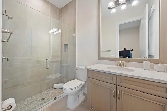 a view of a house with swimming pool and sitting area